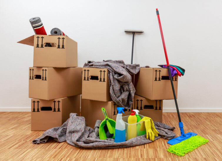 Move-In and Move-Out Cleaning Services Boxes and cleaning supplies for move-in/move-out property cleaning.